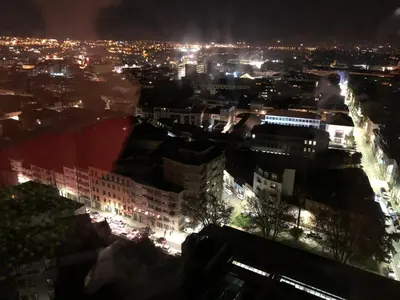 a view of a city at night with lights at All in flat by, city center, skyline in Porto