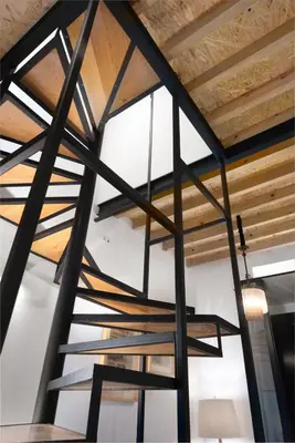 a staircase in a building with wooden beams at Porto National Theatre Trendy Houses in Porto