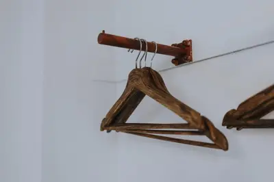 a pair of wooden beams hanging from a ceiling at aDuquesa - GuestHouse in Porto