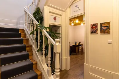 a staircase in a home with a stair case at aDuquesa - GuestHouse in Porto