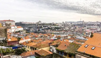 a view of the city of lyon with roofs at São Miminho 3º in Porto