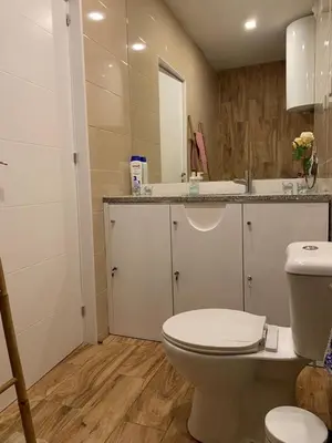 a bathroom with a toilet and a sink at City Heart Place 4 in Porto