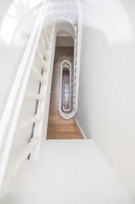 a staircase in a doll house with a ladder at GuestReady - Porto D'Alma - Stª Catarina 1E in Porto