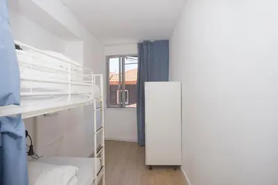a door with a remote control in front of a staircase at Porto Automatic in Porto