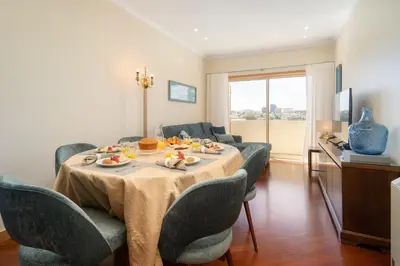 a living room with a table with food on it at Host Wise - Anna Flats in Vila Nova de Gaia