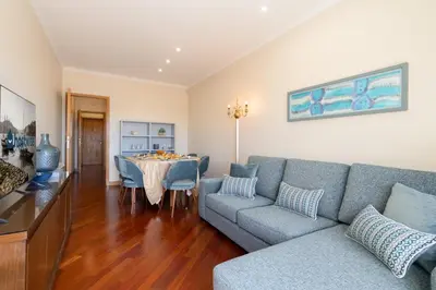 a living room with a couch and a table at Host Wise - Anna Flats in Vila Nova de Gaia
