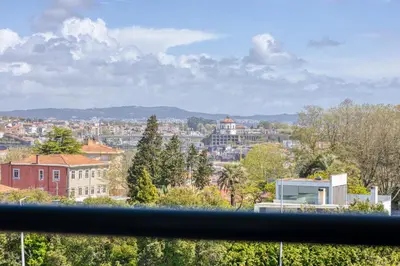 a view of a city with buildings and trees at Candal Douro in Vila Nova de Gaia