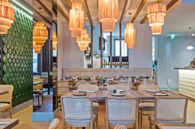 a lobby with chairs and a waiting room at Pur Oporto Boutique Hotel by actahotels in Porto