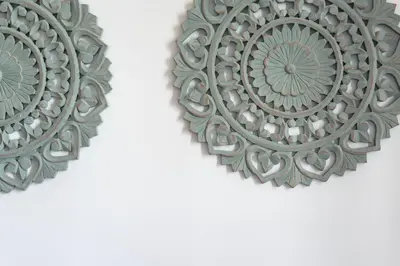 a pair of metal plates on a white wall at LovelyStay - The Porto Getaway Duplex - Free Parking in Porto