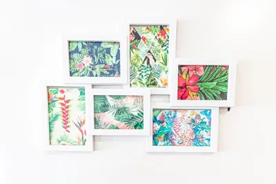 a group of nine framed illustrations of tropical plants at Guest H4U - Porto Batalha City Center in Porto