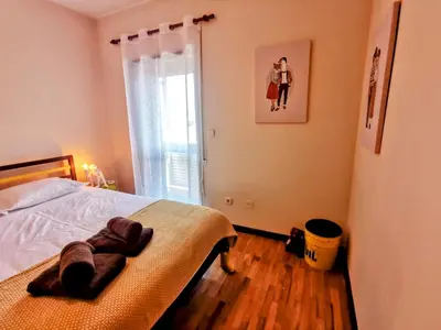 a bedroom with a bed and a window at Coronel Pacheco 42 - Porto in Porto