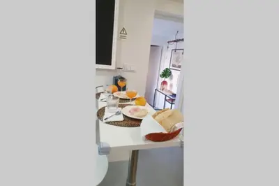 a table with several baskets of food on it at T2P Mimosa House in Vila Nova de Gaia