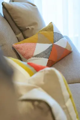 a couple of pillows sitting on a couch at Stayin Apartments - Rua do Sol in Porto