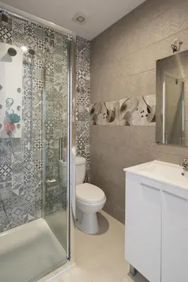 a bathroom with a shower and a toilet and a sink at Moreira 284 in Porto