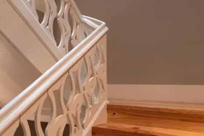 a staircase with wooden railings and wood floors at Cedofeita Premium Apartment 1B in Porto