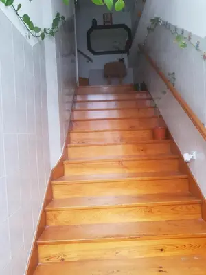 a staircase with wooden floors in a room at Truz truz2 in Porto