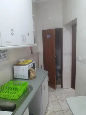 a kitchen with a counter with a microwave on it at Truz truz4 in Porto