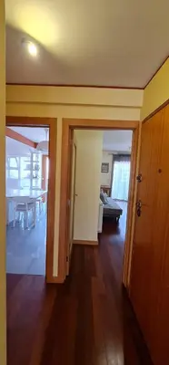 a room with a living room and a dining room at Azulejos Apartment in Porto