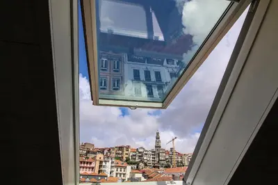 a window with a view of a city at MSC Flat 8 in Porto