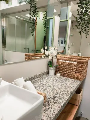 a bathroom with a sink and a mirror at Porto Santa Catarina - Apartment with Terrace in Porto