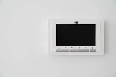 a white microwave oven on a white wall at Amy Porto in Porto