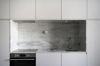 a kitchen with a sink and a counter top at Amy Porto in Porto