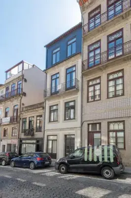 a black van parked in front of a building at Sweety Balcony Porto Center in Porto