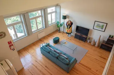 an overhead view of a living room with a couch at History Porto in Porto