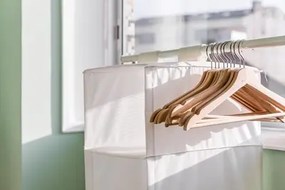 a wooden hanger in a white refrigerator at GuestReady - Wellspring Bloom in Porto
