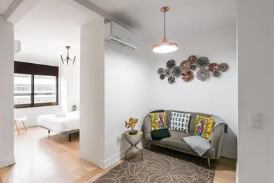 a living room with a couch and a table at GuestReady - Mystic Subdual in Porto