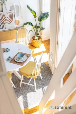 a dining room with a table and chairs at Flores - Delight Loft Porto - Next to Ribeira in Porto