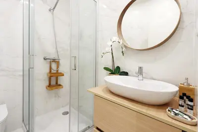 a bathroom with a sink and a shower at HM - Segredo do Porto in Porto