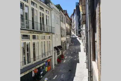 an empty street in a city with buildings at Charming Clérigos Studio in Porto