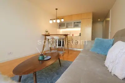 a living room with a couch and a table at Oasis in Porto by SpiritBnb in Porto