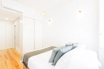 a kitchen with a counter top with a coffee maker at Bonfim Perfect Stays in Porto