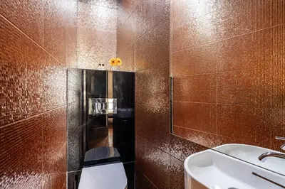 a bathroom with a toilet and a sink and a mirror at 118 Oporto Apartments in Porto