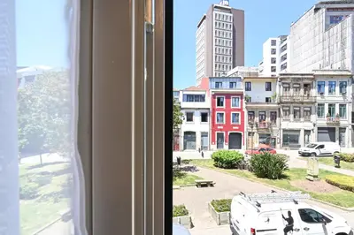a view of a city street from a window at ON Apartments - Garden View in Porto
