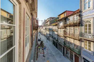 a view from a window of a street with buildings at YOUROPO - Flores in Porto