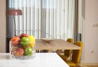 a vase of fruit sitting on a table at ChillHouse_Porto - Praça da República in Porto