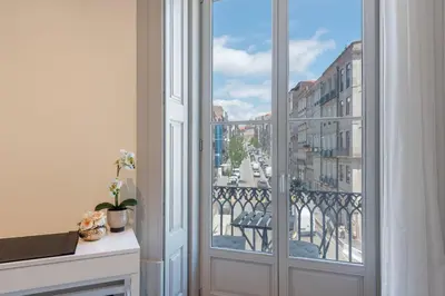 a balcony with a view of a city at LovelyStay - Deluxe 2BR Duplex with Splendid View in Porto