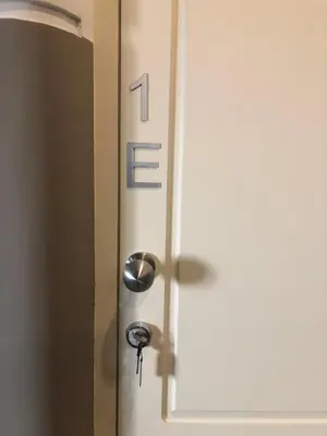 a door with the number one on it at CC Downtown Palace - E in Porto