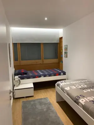 a bedroom with two beds in a room at Palace House Apartment in Porto