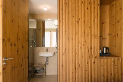 a bathroom with a sink and a mirror at JAM Porto in Porto