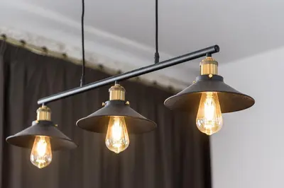 a group of lights hanging from a ceiling at GuestReady - The Art of Music in Porto
