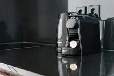 a toaster sitting on top of a kitchen counter at GuestReady - Hemisphere Apt in Porto