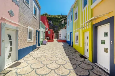 an alley with colorful buildings in a city at Maredimo Village Porto Casa 5 in Porto