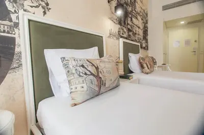 a bedroom with a wall mural of a bridge at Aliados Downtown Studio by Porto City Hosts in Porto