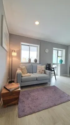 a living room with a couch and a table at Gaiapart in Vila Nova de Gaia