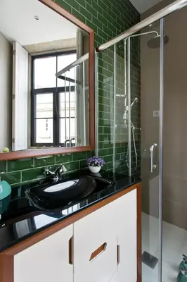 a bathroom with a sink and a glass shower at ON Apartments - Center in Porto