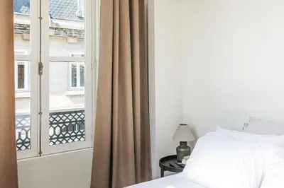 a bedroom with a bed and a window at Oportments - S.Bento in Porto